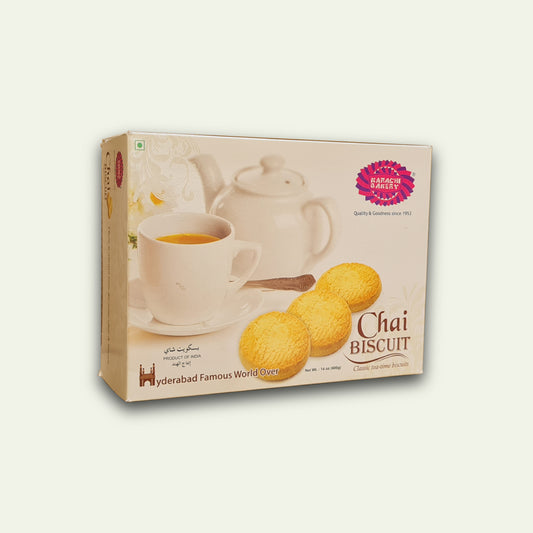 Packaging for Karachi Bakery Biscuits 400g showing the product name, an image of a cup of tea and biscuits, and some decorative elements.