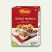 Packaging of Shan Chaat Masala, a seasoning mix with images of spiced food on the cover, including a dish of dal tadka, a dish of chicken tikka masala, and a bowl of chaat.