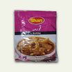 A red pack of Shan Korma Masala. The packaging features an image of a bowl containing korma gravy or curry as well as the brand's logo.